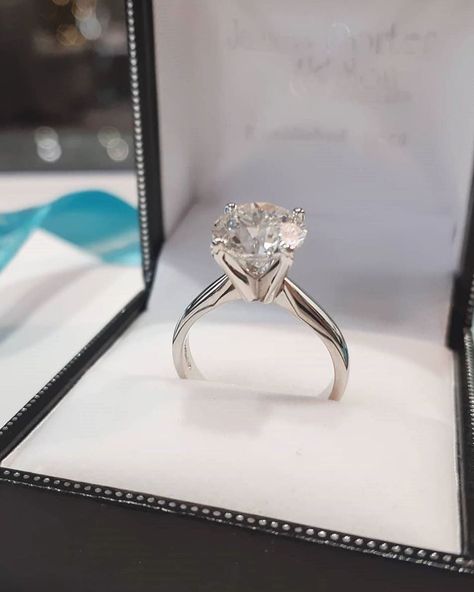 YES! platinum round brilliant cut 3ct solitaire in a high Tiffany style v- setting #tiffanys #engagamentring #3ct Tiffany Setting Engagement Ring, Cushion Cut Wedding Rings, Tiffany Wedding Rings, Stunning Rings, Tiffany Setting, Tiffany Engagement Ring, Fine Engagement Rings, Engagement Rings Sale, Cushion Cut Engagement Ring