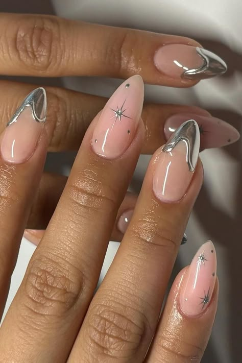 Add a touch of elegance and edge to your style with these sophisticated sheer pink stiletto nails featuring silver chrome French tips and delicate star designs. The perfect blend of chic and glam to make a fashion-forward statement. ✨ // Photo Credit: Instagram @ceesclaws Silver Nail Designs, Pink Chrome Nails, Chrome Nails Designs, Silver Nail, Her Nails, Star Nails, New Year's Nails, Silver Nails, Prom Nails