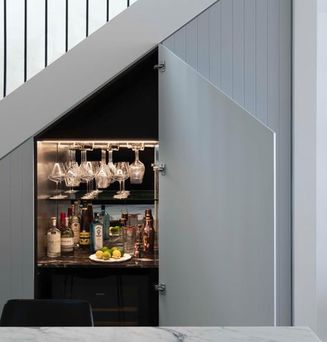 17 More Cool Features Spotted in Recent Renovations | Houzz NZ Bar Fridge Cabinet, Under The Stairs Bar, Contemporary Loft Design, Storage For Glasses, Bar Under Stairs, Drinks Cupboard, Mid Modern House, Rec Room Bar, Wet Bar Designs