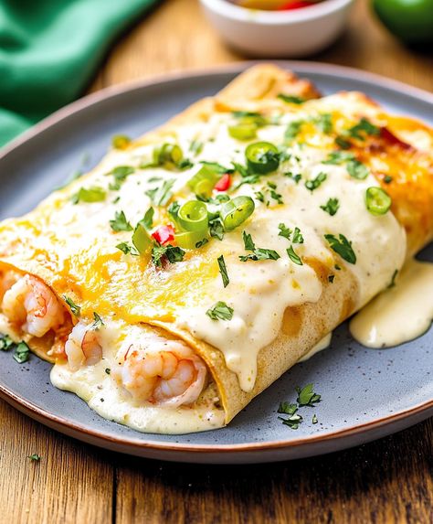 Creamy Shrimp Enchiladas Recipe Easy Creamy Shrimp Enchiladas, Easy Shrimp Enchiladas Recipes, Shrimp Enchiladas With White Sauce, Shrimp And Crab Enchiladas, Crab Enchiladas, Creamy Shrimp Enchiladas, Shrimp Enchiladas Recipes, Seafood Enchiladas Recipe, White Sauce Enchiladas