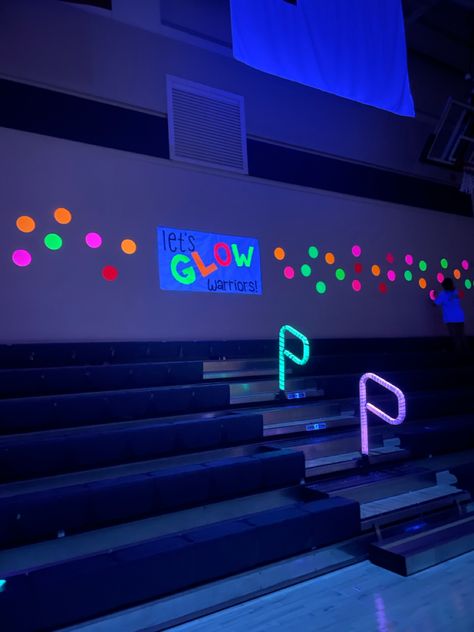 Glow In The Dark Hoco Theme, Neon Nights Homecoming, Glow Pep Rally Ideas, Rally Decorations Ideas, Spirit Club Ideas, Neon Pep Rally Posters, Neon Poster Ideas For School, School Rally Ideas, Glow Homecoming Theme