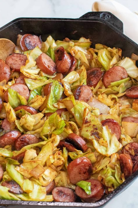 A classic Polish dish! This One Pan Cabbage and Kielbasa is a perfect quick and easy weeknight meal and can be ready and on the table in just 30 minutes! #cabbageandkielbasa #recipe #skillet #onepan #keto Cabbage And Kielbasa Skillet, Kielbasa Dinner Recipes Healthy, Polish Sausage Cabbage Recipes, Cabbage Potato Kielbasa Skillet, Kielbasa Recipes Cabbage, Cabbage Kielbasa Potatoes Skillet, Kielbasa Cabbage And Pierogies, Potatoes Cabbage And Kielbasa, Kielbasa With Cabbage