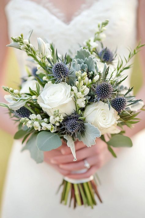 These 49 wedding bouquets with thistles are perfect for rustic romance. From barn weddings to countryside celebrations, thistles add earthy charm to any bouquet. Explore this collection of creative floral ideas to inspire your big day. #rusticwedding #thistleflowers #bouquetinspo Blue Rustic Wedding Bouquet, White And Thistle Wedding Flowers, Blue Thistle Wedding Bouquet, Wedding Bouquet With Thistle, Dusty Blue Wedding Bouquet Brides, Bouquet With Thistle, Thistle Flower Arrangement, Thistle Centerpiece, Wedding Bouquets Hydrangea