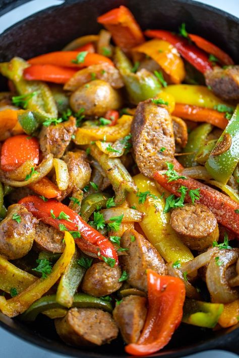 Easy Sausage and Peppers made from Italian sausage, bell peppers, onions, and seasoning is the perfect thing to bring to a potluck, or make in bulk for a party. It comes together in 30 minutes, and reheats well the next day! Sausage And Peppers Stove Top, Keto Stew Recipes, Keto Stew, Keto Sausage Recipe, Sausage And Veggies, Ground Beef Breakfast, Smoked Sausages, Sausage Peppers And Onions, Cajun Sausage