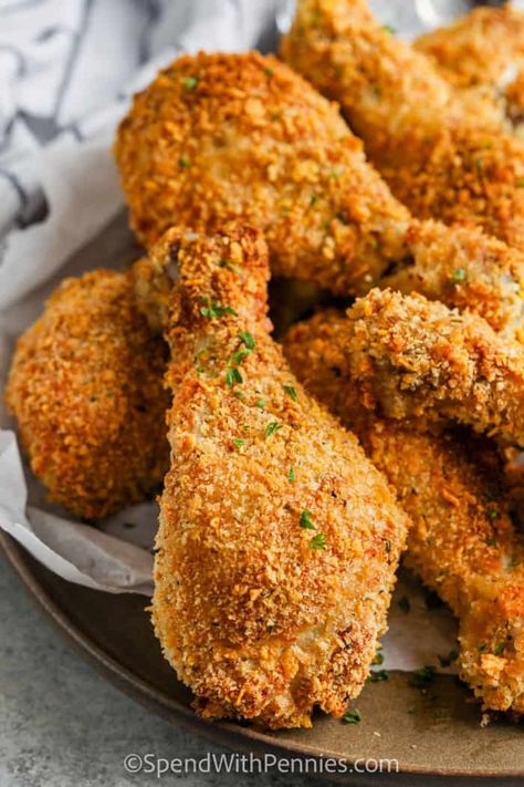 Chicken drumsticks are yummy hot or cold! Hot and ready for a potluck or chilled and ready for a picnic. Kids and grownups alike love crispy baked chicken drumsticks!  #spendwithpennies #chickendrumsticks #recipe #crispychicken Parmesan Chicken Drumsticks, Crispy Drumstick Chicken Recipes, Crispy Baked Chicken Drumsticks, Chicken Drumstick Recipes Oven, Drumstick Recipes Oven, Baked Drumsticks, Fried Chicken Drumsticks, Baked Breaded Chicken, Baked Chicken Drumsticks