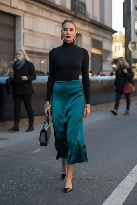 15 Fabulous Skirt Outfit Ideas to Rock Any Season 5 Emerald Green Silk Skirt, Green Silk Skirt Outfit Summer, Dark Green Satin Skirt Outfit, Maxi Green Skirt Outfit, How To Style Green Skirt, Mermaid Maxi Skirt Outfit, Teal Satin Skirt Outfit, Green Velvet Skirt Outfits, Navy Green Outfit