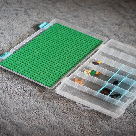 Create an easy DIY Lego travel case in five minutes flat using a storage box with adjustable compartments and some ingenious peel-and-stick baseplates. Perfect for Lego storage and play on the go! Lego Travel Case, Lego Storage Solutions, Lego Diy Crafts, Diy Lego, Travel Christmas Gifts, Lego Diy, Lego Activities, Lego Craft, Lego Storage