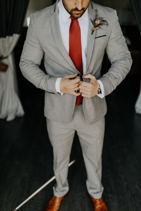 Rust Wedding Mens Attire, Gray Suit Rust Tie, Grey Tux Red Tie, Grey Suit With Rust Tie, Tan Suit With Red Tie, Rust Wedding Groom Attire, Fall Wedding Groom Attire Grey, Grey Suit Rust Tie Wedding, Tan Suit With Burnt Orange Tie