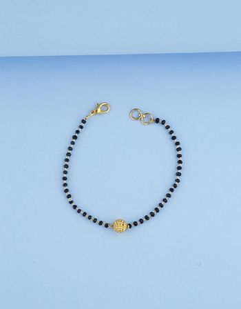 Fancy Design With Sphere Gold Ball Hand Mangalsutra For Women Black Beads Hand Bracelet Gold, Black Beads Bracelet Gold For Women, Hand Mangalsutra Bracelet In Gold, Black Beads Bracelet Gold, Hand Mangalsutra Bracelet, Bracelet Mangalsutra, Hand Mangalsutra, Baby Bracelet Gold, Baby Jewelry Gold