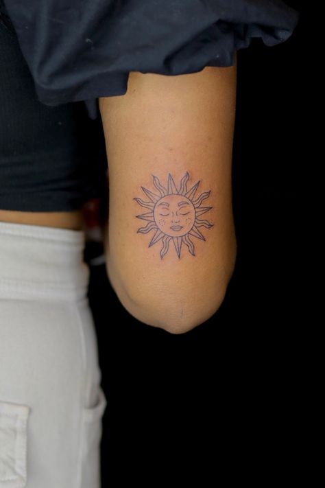 Tattoo ideas for women, sun tattoo, arm tattoo, tattoos for women, minimal tattoo, sun design tattoo, fine line tattoo Sun Back Arm Tattoo, Boho Soul Tattoo, Sun Emoji Tattoo, Simple Sun Tattoo With Face, Sun Tattoo Elbow Crease, Bold Sun Tattoo, Sun On Back Of Arm Tattoo, Mother Sun Tattoo, Zodiac Sun Tattoo