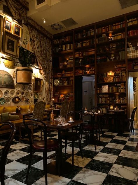 Goth Cafe Interior, Old Fashioned Cafe Interior, Aesthetic Cafe Interior Vintage, Bookstore Cafe Aesthetic Vintage, 1920s Coffee Shop, Cozy Coffee Shop Aesthetic Vintage, Coffee Shop Interior Design Cozy Vintage, Coffee Shop Dark Academia, Gothic Cafe Interior