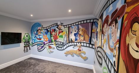 Disney painted mural for children's tv room pluto monsters inc Disney Feature Wall, Disney Themed Mural, Mickey Mouse Wall Mural, Disney Room Painting, Disney Painted Wall Mural, Lilo And Stitch Home Decor, Movie Murals Wall Art, Disney Movie Room Ideas, Disney Mural Ideas