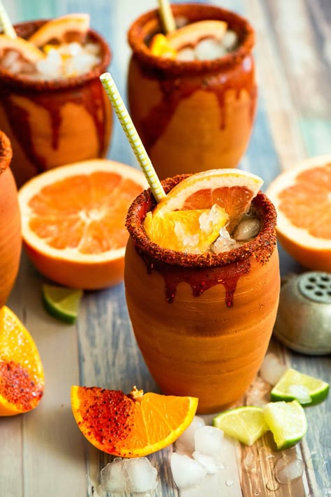 Cantaritos or jarritos. This refreshing drink will cool you off during the hot summer months. Made with three different kinds of citrus juice, tequila blanco and grapefruit soda. Jarritos Drink Tequila, Mexican Cocktails, Mexican Birthday Parties, Mexican Drinks, Grapefruit Soda, Mexican Party Theme, Tequila Drinks, Michelada, Clay Cup