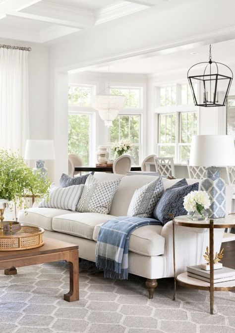 Bria Hammel Interiors Kitchens, Cottage Hamptons Style, Transitional Blue Living Room, Hamptons Chic Decor, Blue Cream Wood Living Room, Hamptons Style Christmas, Coastal Couches, Coastal Living Rooms With Dark Wood, Neutral Living Room With Blue Accents