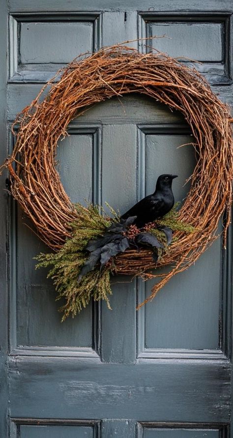 Elevate your Halloween decor with these enchanting wreath ideas. Transform a grapevine base into a witch's lair by adding broomsticks, potion bottles, and faux moss. Weave in purple and orange ribbon for a pop of color. These Halloween wreath ideas blend whimsy and wickedness, creating a focal point that sets the tone for your spooky celebrations. Customize with battery-operated candles for an eerie flickering effect that will bewitch all who approach your door. Witch Lair Halloween Decor, Witchy Front Door Decor, Fall Grapevine Wreath Ideas, Witch Door Decoration, Witchy Wreaths, Witches Door, Halloween Wreath Ideas, Witch Door, Spooky Wreath