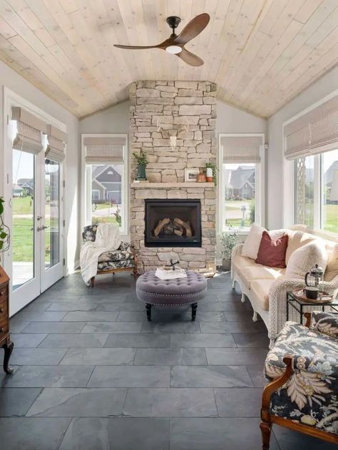 26 Creative 3 Season Porch Ideas to Inspire Your Next Cozy Retreat - placeideal.com Black Three Season Room, 3 Season Room Ceiling Ideas, Fireplace Sunroom Ideas, Screened In Porch With Patio, Three Season Room With Fireplace, 4 Seasons Room With Fireplace, Enclosed Porch Furniture Ideas, 3 Season Room With Fireplace, 3 Season Porch Flooring Ideas