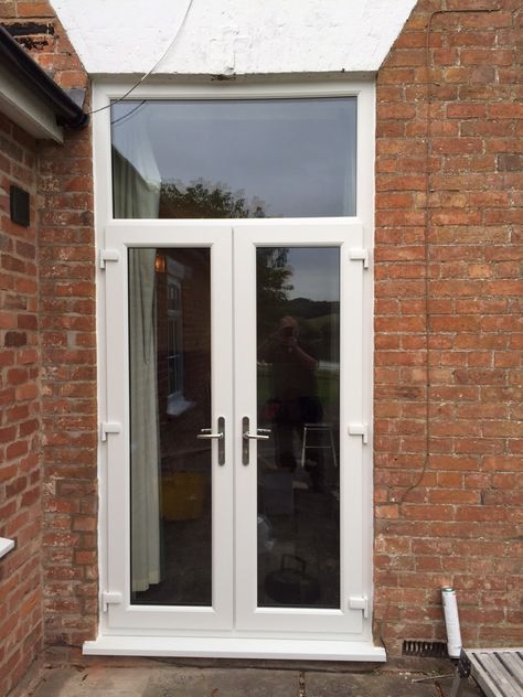 White uPVC French doors with 'A' rated double glazed units. French Doors White, Upvc French Doors, External French Doors, Kerb Appeal, French Doors Patio, White Windows, White Garden, White Gardens, Garden Doors