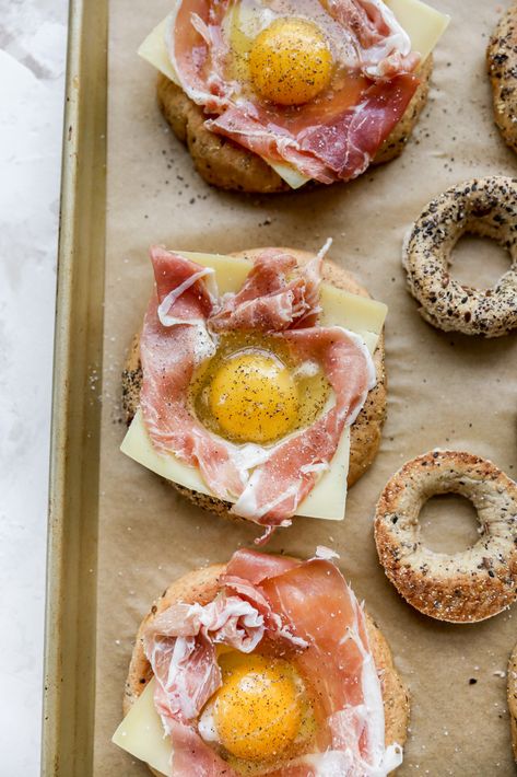 Prosciutto Bagel Sandwich, Bagel With Prosciutto, Baked Egg In A Hole, Air Fryer Bagel Breakfast, Eggs In A Bagel Hole, Bagel Egg Breakfast, Bagels With Eggs, Fried Egg Bagel, Cheesy Egg Bagel