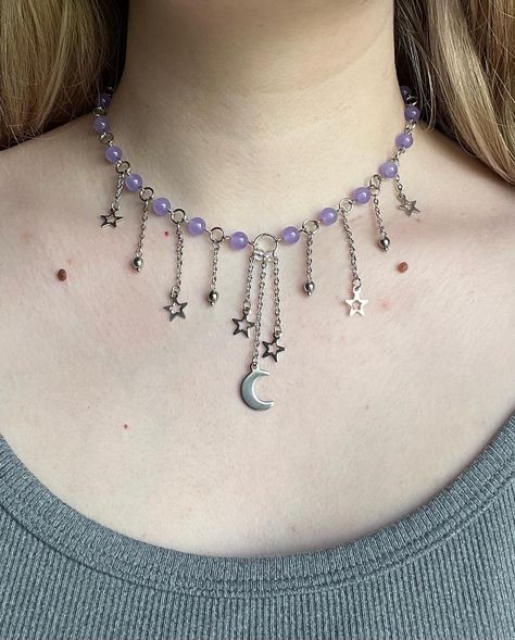 ‘Mystic’ Necklace 🌙 made with purple stone beads, stainless steel charms, and stainless steel findings 35cm + 7cm extension chain #jewelry #necklace #handmade #moon #stars #etsy Necklaces Inspo Beads, Purple Handmade Jewelry, Chain Necklace Outfit, Alt Jewelry, Purple Beaded Necklace, Necklaces Beads, Mystical Necklace, Bead Accessories, Purple Accessories