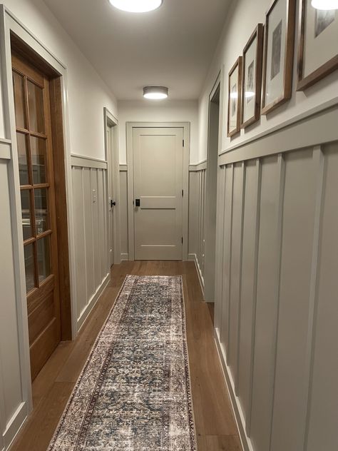 Colonial House Update, Half Wall Foyer, Narrow Hallway With Doors, Hallway Decorating Ideas Wall, Old Farmhouse Hallway, Craftsman Hallway Ideas, Old Farmhouse Upstairs Hallway, Hallway Wallpaper Inspiration, Entryway To Basement Stairs