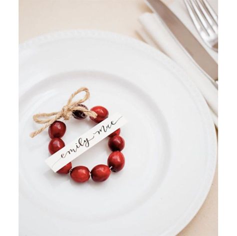 10 DIY Christmas Place Cards for Your Holiday Table - PureWow Holiday Name Place Cards, Christmas Placecards Ideas, Christmas Place Card Ideas, Christmas Place Settings Diy Name Cards, Diy Christmas Place Cards, Christmas Name Place Ideas, Christmas Place Settings Diy, Christmas Place Cards Diy, Christmas Table Name Cards