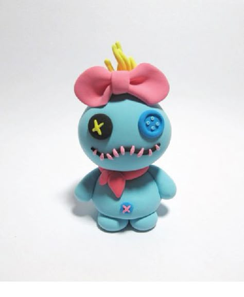 Polymer clay Scrump. As Lilo would say, "She's recovering from surgery." Jumping Clay Ideas, Disney Clay Sculpture, Clay Ideas Disney, Disney Clay Art, Cute Polymer Clay Ideas Kawaii, Diy Clay Figures, Disney Clay Ideas, Cute Polymer Clay Kawaii, Polymer Clay Sculpture Ideas