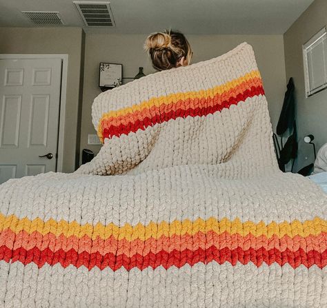 16 Beginner-Friendly Crochet Blanket Tutorials Mega Chunky Crochet Blanket Pattern, Crochet Blankets Aesthetic, Finger Knitted Blanket, Chunky Knit Blanket On Bed, Hand Knitted Blanket Chunky, Finger Blanket Crochet, Afghan Loom Patterns Blankets, Chunky Blanket Color Combos, Chunky Blanket Designs