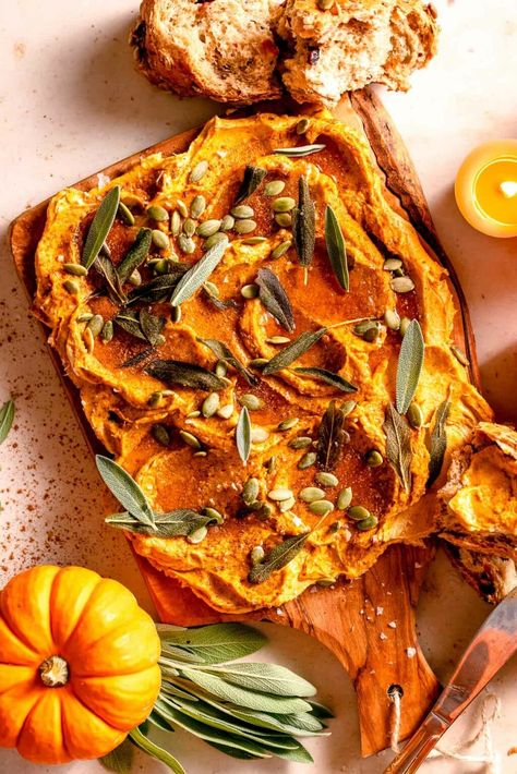 This pumpkin butter board is the perfect fall appetizer. It's sweet, savory, and spiced. Serve with crusty bread, crackers, or scones. Butter Board Thanksgiving, Halloween Butter Board, Butter Board Ideas Fall, Savory Pumpkin Appetizers, Butter Board Halloween, Brie And Pumpkin Butter, Charcuterie Butter Board Ideas, Thanksgiving Butter, Fall Butter Board