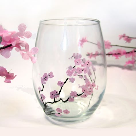 How to hand paint glass with flowers such as these lovely spring cherry blossoms using Martha Stewart Crafts glass paint and simple wine glasses from a dollar store. DIY, handmade, Martha Stewart Crafts, Glass Paint, Cherry Blossom, how-to, Pink flowers, Cherry Tree, make your own, homemade Goodbye Winter, Diy Wedding Video, Wine Glass Painting, Amazing Finds, Glass Painting Designs, Martha Stewart Crafts, Wine Glass Crafts, Cherry Blossom Branch, Wine Glass Art