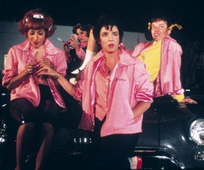 The musical movie, Grease, was filmed in the late 1970s. It’s set in the 50s and is about a wild high school romance between T-Bird Danny Zuko and good girl Sandy Olsson. They have a whirlwind summer romance that ends with a bittersweet farewell. That is until Sandy finds out that she’s not moving back Grease Fashion, Frenchy Grease, Rizzo Grease, Grease Aesthetic, Dinah Manoff, Pink Lady Costume, Pink Ladies Grease, Grease Outfits, Grease 1978