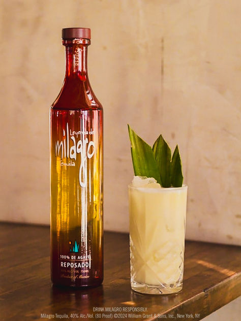 Shake up your classic with the Tequila Colada: Combine 2 oz Milagro Reposado Tequila, 1 oz Lime Juice , 2 oz Coconut Cream and 2 oz Pineapple Juice. Mix all ingredients together. Serve in a large glass with two pineapple fronds. Best Margarita Recipe, Best Margarita, Reposado Tequila, Blue Agave, Margarita Recipe, Hispanic Heritage Month, Margarita Recipes, Oak Barrel, Hispanic Heritage