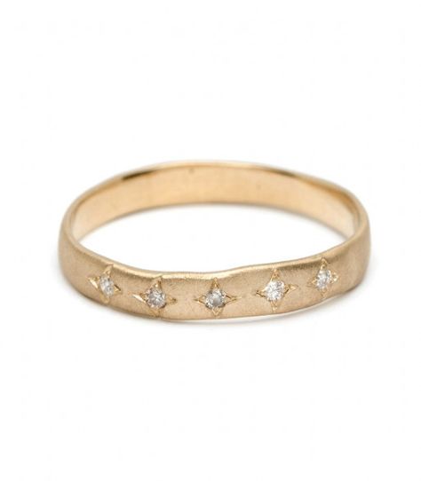 A woman without jewelry is like a night sky without stars! Inspired by this quote our classic 14K gold torn paper edge band takes on a whole new look with 5 twinkling diamonds spread across the top of the band. Each diamond is set with star shaped design. Twinkle twinkle we wish for this ring in every color! A perfect wedding band for the natural beauty bride. Ring is approximately 3mm wide. Also available with a patch of pavé diamonds or as an eternity pavé diamond band. #divorce Paper Diamond, Favorite Engagement Rings, Wedding Band Designs, Pave Diamond Band, Jewelry Advice, Art Ring, Diamond Stacking Rings, Ring Inspo, Stacking Ring Set