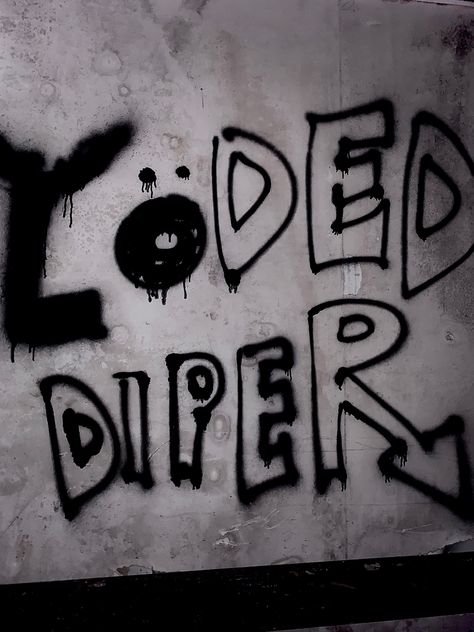 Loded Diper logo graffitied on wall Spray Paint Bedroom Wall Aesthetic, Spray Paint Aesthetic, Grunge Graffiti, Wall Spray Painting Art Aesthetic, Spray Paint Ideas Graffiti, Spray Paint Room, Person Spray Painting A Wall, Spraypaint Aesthetic Grunge, Spray Painted Bottles