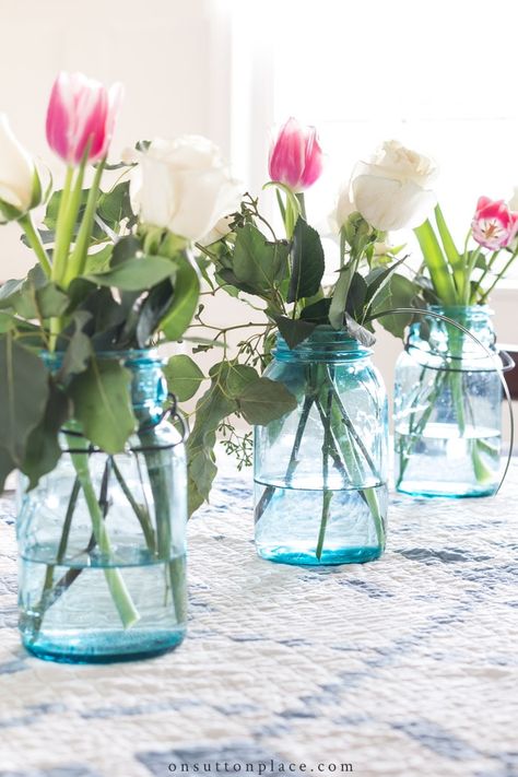 Decorating with Mason Jars from On Sutton Place February Table Decorations, Seminar Decor, February Decorations, Decorating With Mason Jars, Blue And White Table Setting, Tablescapes Ideas, Brunch Decor, Shower Vintage, Baby Shower Table Decorations