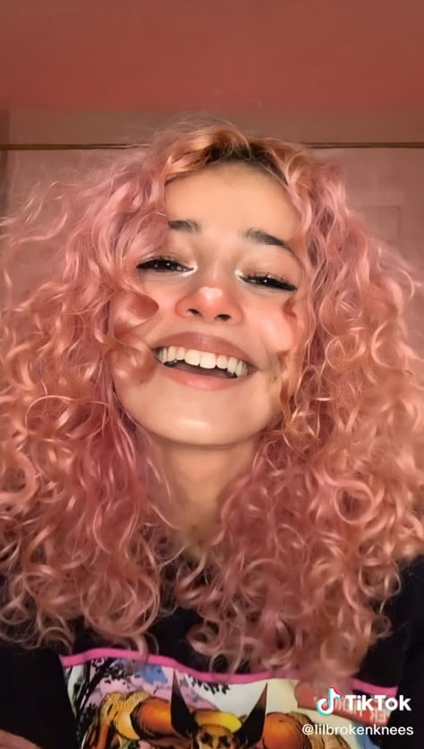 @lilbrokenknees on tiktok is my hair goals! 🥲 Pink Hair On Curly Hair, Curly Light Pink Hair, Curly Peach Hair, Peach Curly Hair, Fun Pink Hair, Hair Dye On Curly Hair, Light Pink Hair Dye, Hair Dye Inspo Curly Hair, Dye Curly Hair