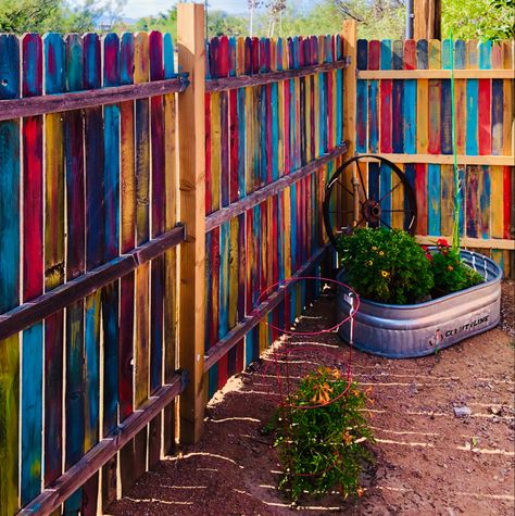 Rainbow Fence Backyards, Fence Painting Ideas Diy Projects, Garden Fence Art Creative Ideas, Boho Fence Ideas, Colorful Fence Ideas, Painted Privacy Fence Ideas, Painting Fences Ideas Backyards, Fence Mural Ideas Backyards, Painted Fences Ideas Backyards