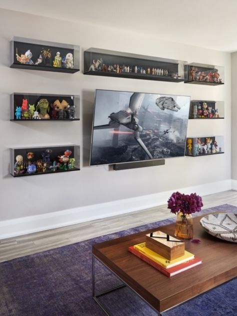 11 Easy Gallery Wall Ideas That Work In Every Space | Chatelaine Display Cases For Action Figures, Large Wall Display Shelves, Man Cave Display Ideas, Collectors Display Shelves, Display Cases For Collectables, Collectors Display Ideas, Action Figures Shelves, Home Office Display Wall, Game Room Display Shelves