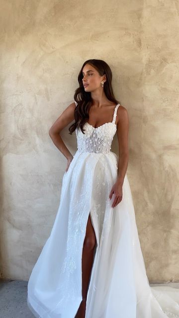 MADI LANE BRIDAL on Instagram: "This combo of 3D florals and a dramatic skirt is just *chefs kiss* Find Paris in a retailer near you," Floral Jacquard Wedding Dress, Wedding Dress Second Look, Unique Wedding Dresses Corset, Wedding Dress Removable Skirt, Wedding Dress With Skirt, Removable Train Wedding Dress, Wedding Dresses With Detachable Skirt, Madi Lane Wedding Dress, Dramatic Skirt