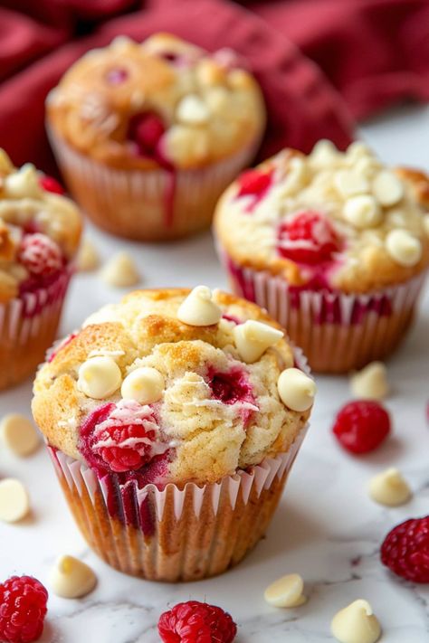 These white chocolate raspberry muffins are an ideal treat for any time of the day. Between the juicy berries and creamy chocolate, they're insanely good. White Chocolate And Raspberry Muffins, Breakfast Loafs, Chocolate Strawberry Muffins, White Chocolate Raspberry Muffins, Raspberry White Chocolate Muffins, Chocolate Raspberry Muffins, Raspberry Cupcake Recipes, Raspberry Ripple Cake, Ripple Cake