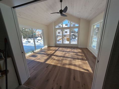 Finished! This 4 season room addition is now complete, look how much sunlight comes in through the MASSIVE windows! Step Down Room Addition, 4 Season Room Windows, Sunroom Connected To Living Room, 3 Season Room With Fireplace, Florida Room Addition, Family Room Addition Off Side Of House, Dinning Room Addition, Cozy Four Seasons Room, Homeschool Sunroom