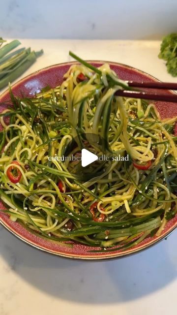 Vegan Recipes on Instagram: "🌱recipe below 👇 follow for more!  By: @foodieholly CUCUMBER NOODLE SALAD 🥗🥒  This one is so fresh and delicious, a twist on one of my favourite Chinese sides - cucumber salad 🤤  INGREDIENTS  - 2 cucumbers - handful coriander  - 2 spring onions  - 1 chilli (optional)  - 1 tbsp soy sauce - 1 tsp chilli oil  - 1 tsp rice wine vinegar  - 2 cloves garlic  - pinch of salt  - 1 tsp sesame seeds   METHOD  - Peel the cucumber with a julienne peeler or alternatively peel it with a potato peeler to make thicker noodles and slice into 1/4’s for bigger noodle salad  - Add to a bowl and top with salt, toss then add coriander, spring onions, chilli  - Combine soy sauce, chilli oil, rice wine vinegar and garlic then pour over the salad and toss with sesame seeds   Use lin Chinese Sides, Cucumber Noodle Salad, Chinese Cucumber Salad, Chinese Cucumber, Cucumber Noodles, Julienne Peeler, Chilli Oil, Asian Inspired Dishes, Potato Peeler