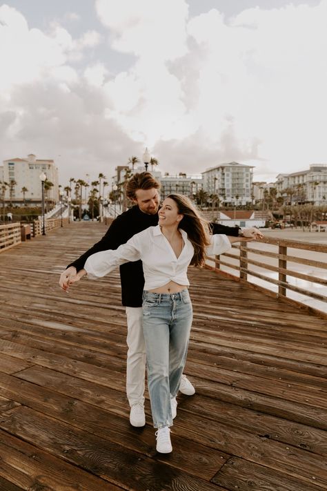 The couple totally entrusted me to capture their love in a candid way in this engagement photoshoot in Oceanside, CA. The Oceanside Pier is the perfect engagement photo location in San Diego. Head over to the blog post to view the full gallery! Monterey Photoshoot, Pier Photoshoot, Water Engagement Photos, Engagement Photos Fun, Oceanside Pier, California Bay Area, First Look Wedding Photos, Candid Engagement Photos, Engagement Photography Ideas