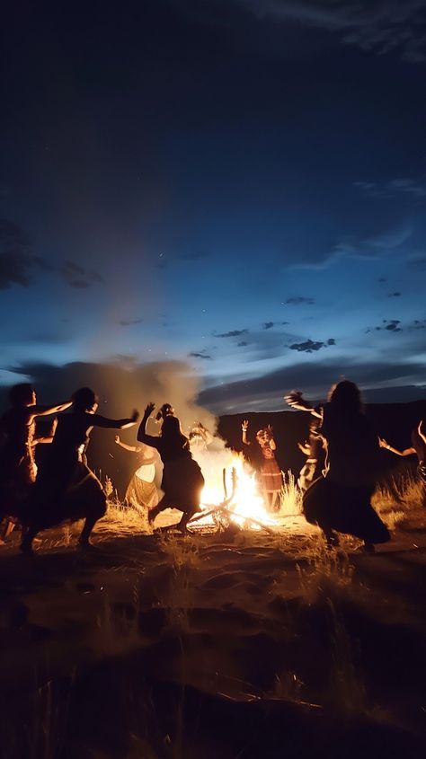 Dancing by Firelight: Silhouetted figures dance energetically around a roaring campfire under the twilight sky, celebrating the night. #dancing #campfire #twilight #silhouette #figures #celebration #night #fire #aiart #aiphoto #stockcake https://ayr.app/l/4CeU Women Dancing Around Fire, Witches Dancing Around Fire, Dancing Around Fire, Fantasy Dancing, Dancing Around A Fire, Wild Dancing, Warrior Dance, Dancing In The Woods, Silhouette Figures