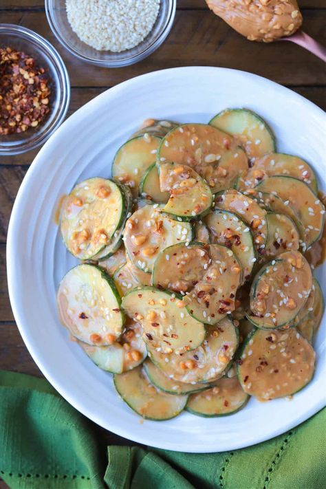 Asian Cucumber Salad is our new obsession! Sliced cucumbers tossed in a creamy, nutty sauce, perfect as a side to dinner or all on its own! Gf Sides, Ww Sides, Gourmet Gluten Free, Party Side Dishes, Greek Chickpeas, It Cover, Asian Cucumber Salad, American Foods, Asian Sauce