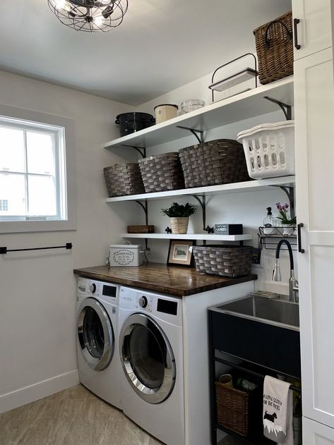 #laundryroomdesign #laundryroomideas #diy Utility Open Shelves, Laundry Room Design With Sink And Storage, Laundry Room Shelves With Baskets, Open Shelves Laundry Room Storage Ideas, Laundry Room Shelves For Baskets, Baskets For Laundry Room Shelves, Utility Room Open Shelving, Stainless Steel Laundry Sink, Laundry Room Organization Open Shelves