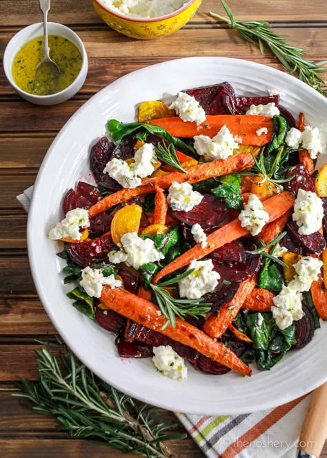 Roasted beets and carrots with sautéed beet greens tossed with honey rosemary vinaigrette and topped with burrata. A perfect fall vegetable side dish. Fall Vegetable Side Dishes, Beet And Carrot Salad, Beetroot And Carrot Salad, Carrots Salad, Roast Beetroot, Sauteed Beet Greens, Salad With Burrata, Beets And Carrots, Roasted Beets And Carrots