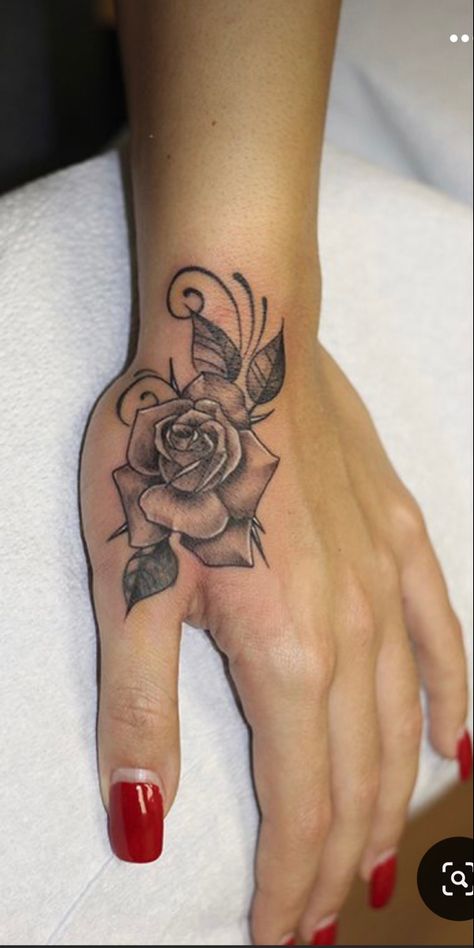 Rose Name Hand Tattoo, Small Rose Hand Tattoo Woman, Roses On Hand Tattoo, Hand Roses Tattoo, Pretty Hand Tattoos For Women Flower, Women Hand Tattoos Ideas Flowers, Flower Tattoo On Hand For Women, Flower On Thumb Tattoo, Rose Vine Hand Tattoo