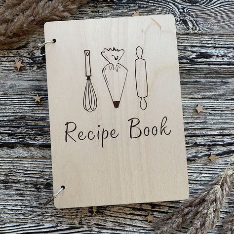 Create your own UNIQUE family recipe book. A WOODEN book cover will keep the best recipes safe. 

Inside 40 sheets 5.8*8.3 inch, easy to write down the right ingredients and cooking processes.

Customization is FREE! If you are searching for something unique, personalized customization on a recipe notebook – wording, name, initials, phrasing or symbol engraved

All our wood recipe book are serving as a perfect gift idea, especially in a cute gift wrapping that is also available in our STORE. Recipe Notebook Ideas Book Covers, How To Make A Recipe Book, Cook Book Cover Design Aesthetic, Wooden Book Cover, Cute Gift Wrapping, Recipe Book Covers, Homemade Recipe Books, Recipe Book Design, Recipe Notebook