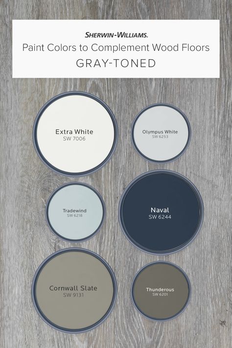 If your wood floors are gray-toned, this palette from Sherwin-Williams can help you pick a wall color to complement them perfectly. Tap this pin to learn why hues like Extra White SW 7005, Naval SW 6244, Cornwall Slate SW 9131, and others can help bring classic charm, bold drama, and more. #sherwinwilliams #woodfloors #graywoodfloors #paint #painting #diy #interiordesign #decor Gray Wood Floors Color Scheme, Navy Walls Light Wood Floors, Barndo Kitchen Ideas Modern, Paint That Matches Dark Wood, What Color Paint Goes With Gray Floors, Navy Paint Palette Colour Schemes, Classic Blue Paint Colors, Blue Grey Carpet Bedroom, Dark Gray And White House Exterior