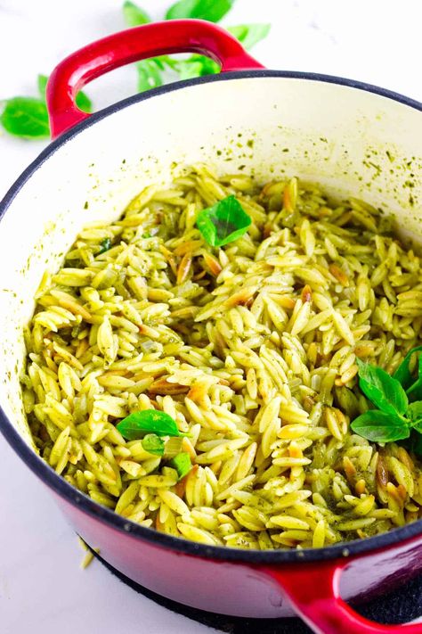 Easy Pesto Orzo offers a vibrant and flavorful twist on the classic pasta dish. This recipe takes just minutes to prepare, making it a perfect side for busy weeknights. Orzo, a small rice-shaped pasta, cooks quickly and absorbs the bright flavors of pesto beautifully. Creamy Orzo Pasta Salad, Orzo With Pesto Recipe, Orzo Pesto Recipes, Pesto Orzo Pasta, Orzo Rice Recipes, Pesto Orzo Recipes, Frozen Casserole Recipes, Orzo Pesto, One Pot Orzo